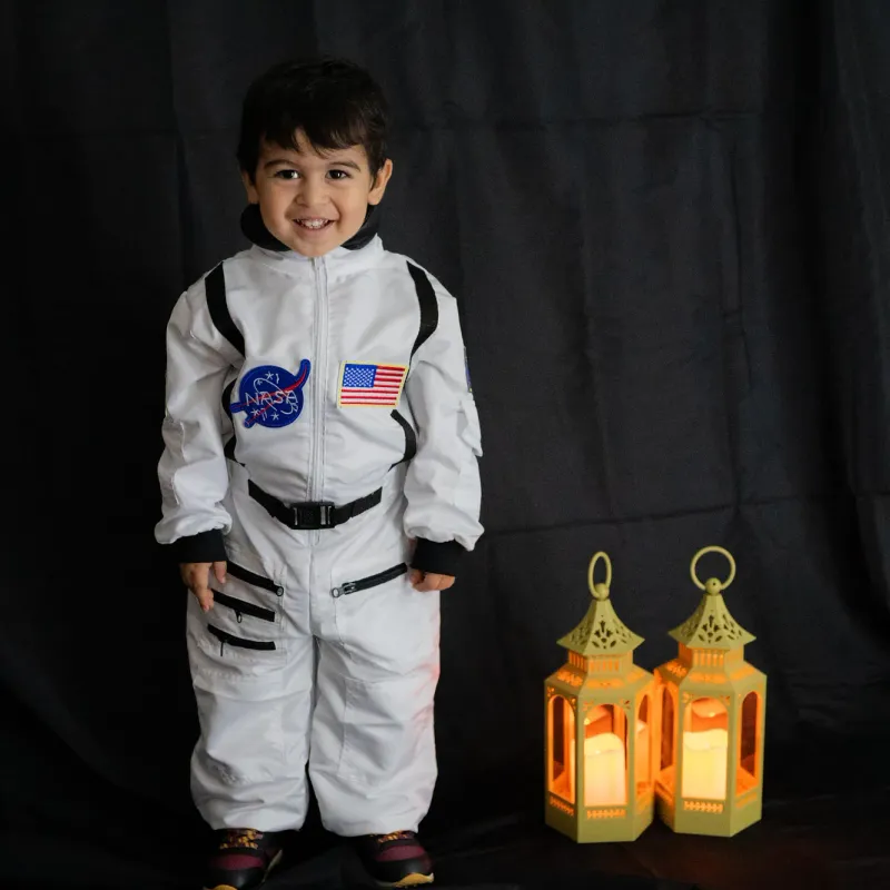 Creative child portrait session with astronaut theme